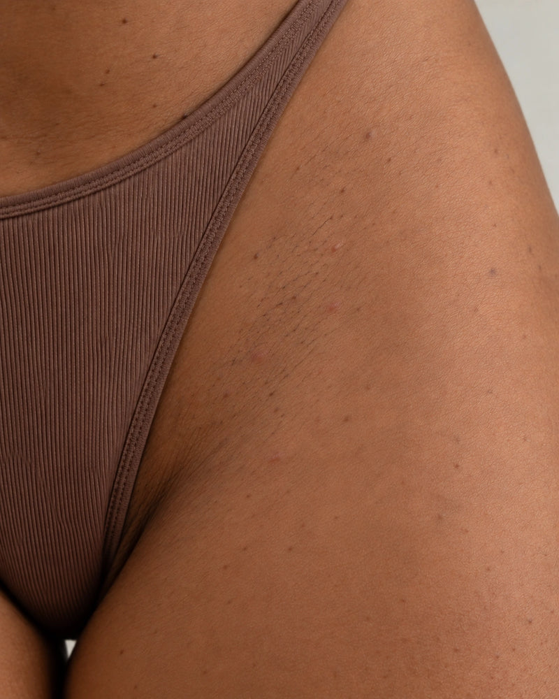 After 10 weeks: the same area with softer, smoother-looking skin while hair, pores and natural pigmentation remain visible.